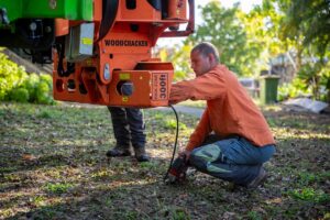 Housed under the grappleunit on the Merlo Roto 50.26S is an advanced Hultdins saw unit. Image: Bush to Beach Tree Services/Leeroy Todd Photography