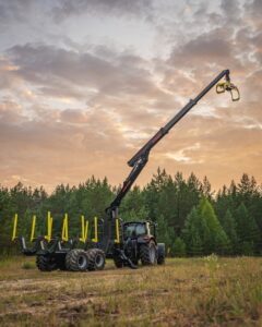 PALMS cranes and grapples can be integrated securely while maintaining tractor balance, visibility, and driveline protection. Image: ALFA