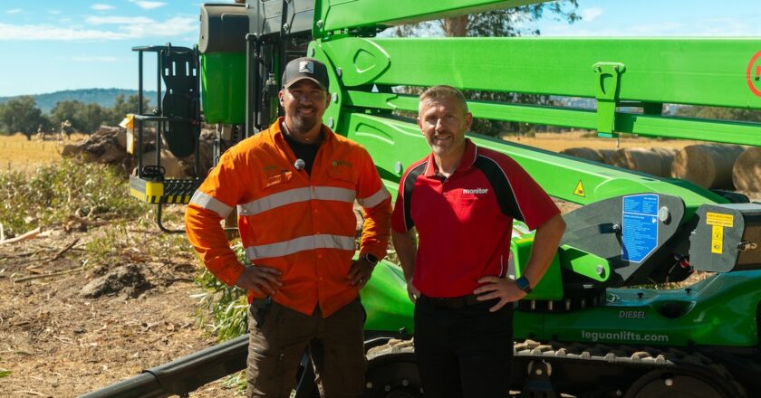 Jordan Taurua (left), owner of Jordans Tree Services, and Will Johnson, Business Development Manager for Monitor Industries in WA on front of the 265 spider lift. Image: Prime Creative Media/Monitor